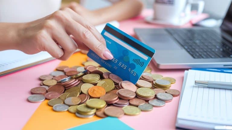 photo of a woman holding a credit card